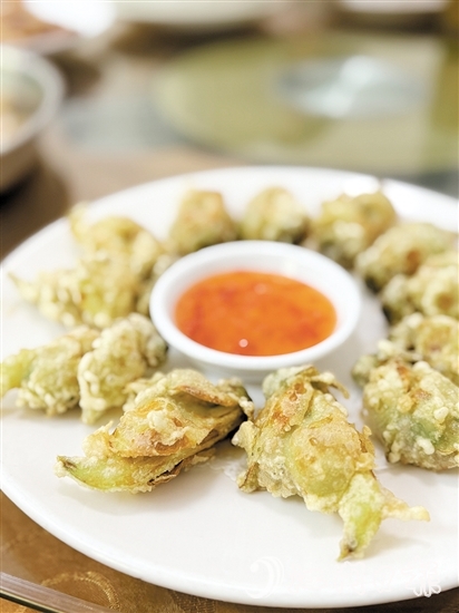 梁記山莊推出的應(yīng)季菜式“炸禾雀花”。